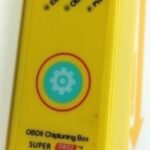 Close up of a ChipPower OBD2 tuning box, a plug-and-play device often marketed for performance enhancement but commonly found to be ineffective.