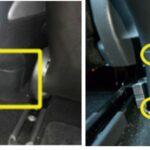 Prying open the rear center console panel of a 2020 Tesla Model 3 to access the OBD2 port location using an Allen wrench.