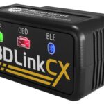 Close-up of OBDLink MX+ Bluetooth OBD2 scanner, showcasing its compact design and brand logo.