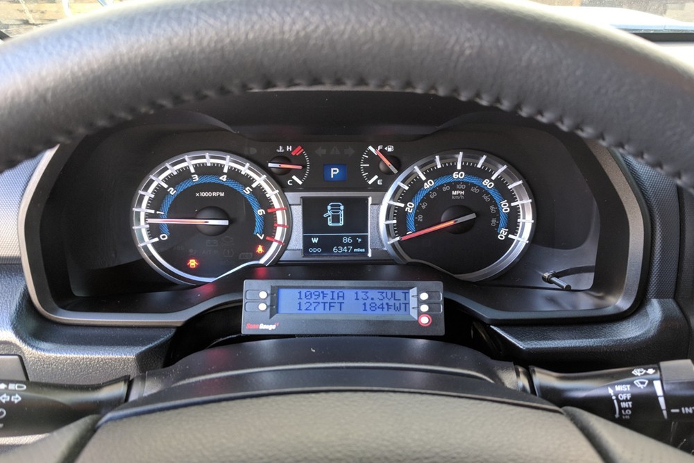 ScanGauge II OBD2 scanner displaying real-time data on a 5th Gen 4Runner dashboard